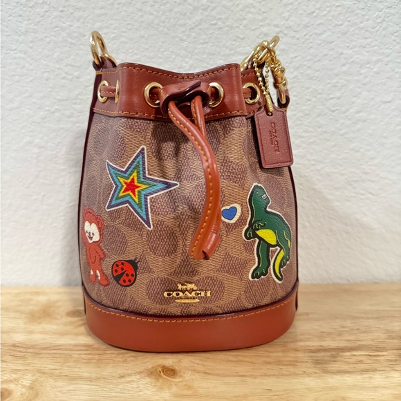 Coach small mini bucket bag - dinosaur sticker design T-Rex - Picture 1 of 6
